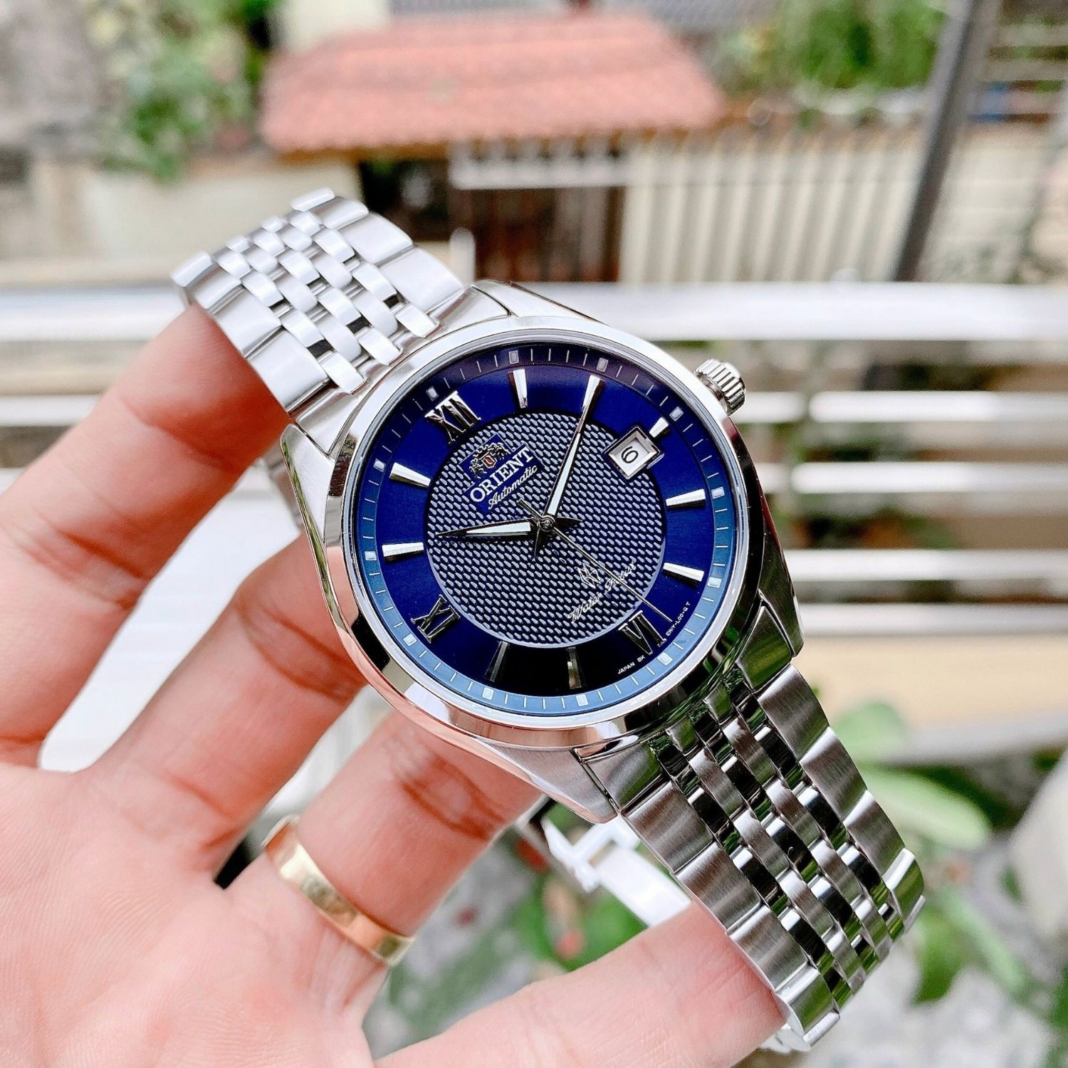 Orient Automatic Mặt Tròn Màu Xanh Dây Kim Loại SER1Y002D0